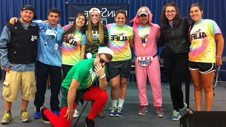 Delsite (second from left) poses with some of her Orientation Leader friends at the Freshman Follies.